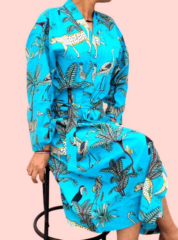 Stay comfortable and stylish with our Jungle Cotton Kimono Robe, made from 100% soft cotton. This robe is light, breathable, and decorated with beautiful hand-painted jungle designs inspired by Rajasthani art. Whether you’re relaxing at home or visiting a spa, this kimono will keep you feeling relaxed.