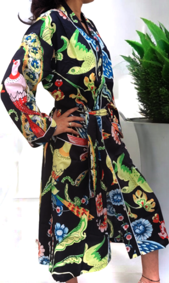 hand-printed cotton kimono, featuring unique animal motifs. Crafted from soft, breathable cotton, this lightweight kimono is perfect for adding a touch of culture and style to your wardrobe. Whether you're lounging at home or wearing it as a casual outer layer, this kimono combines comfort and traditional Indian craftsmanship. Perfect for nature lovers and those who appreciate eco-friendly fashion, this kimono brings together art and sustainability.