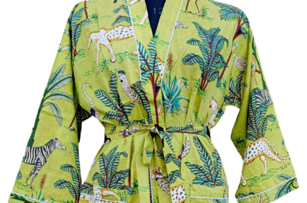 Step into a world of style and comfort with our Pistachio Jungle Cotton Kimono Robe. Crafted from 100% organic cotton, this luxurious robe features a stunning jungle print that adds a vibrant touch to your loungewear collection. The soft, breathable fabric drapes beautifully, providing ultimate comfort for relaxing at home or making a statement during cozy gatherings.