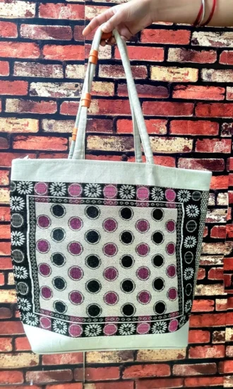 Handmade cotton bag Eco-friendly tote bag Artisan-crafted handbags Sustainable fashion accessories Handmade polka dot bag Durable shopping tote Lightweight fabric handbags Stylish reusable bags